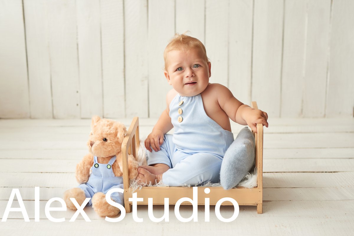 Child plays with toys. Happy Baby. example image 1