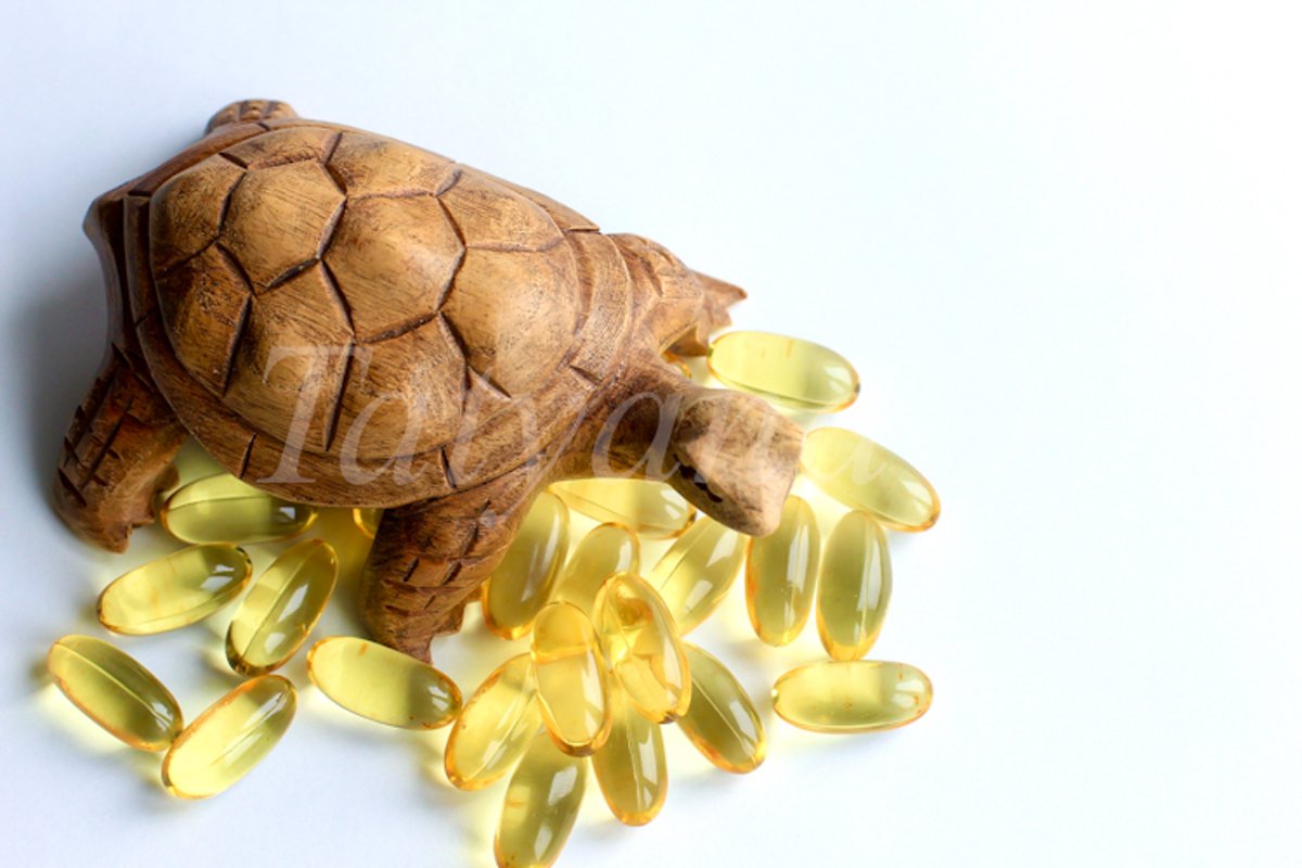 Omega 3 capsules lying on white background example image 1