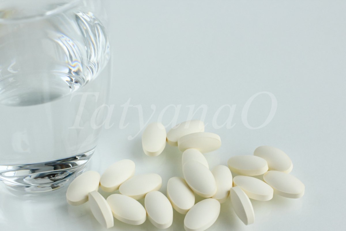 Multicolored pills, tablets against the virus, flu, disease example image 1