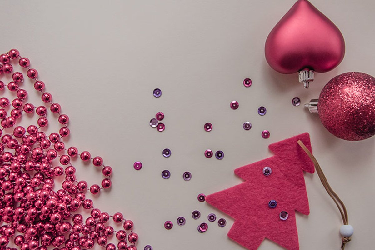 Red Christmas tree, beads, balls on a gray background. example image 1