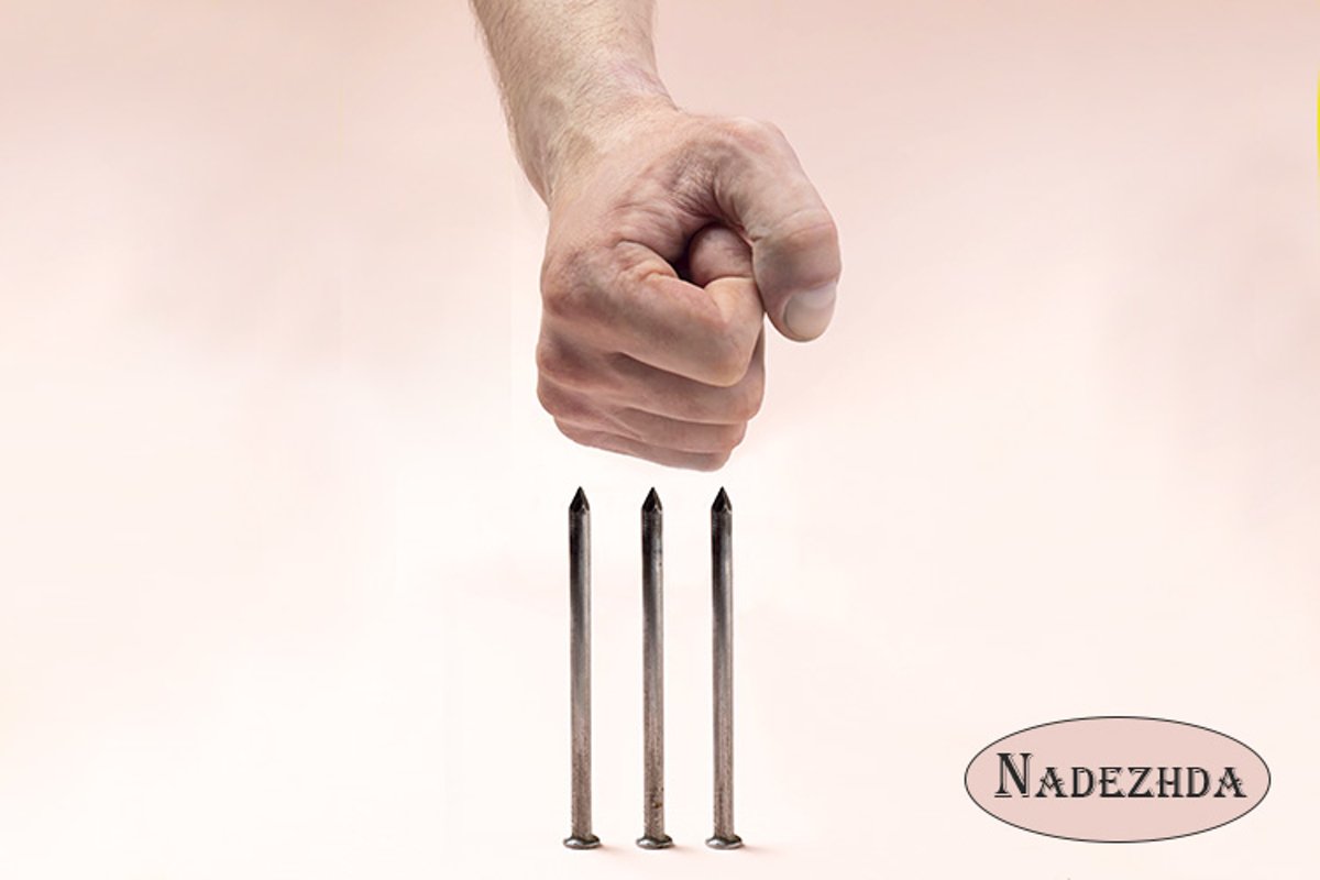 Human fist against sharp nails example image 1