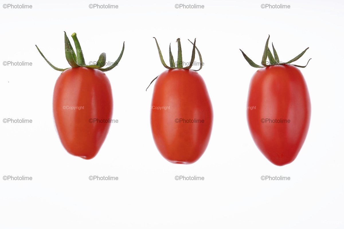 Plum cherry juicy tomatoes isolated on white. example image 1