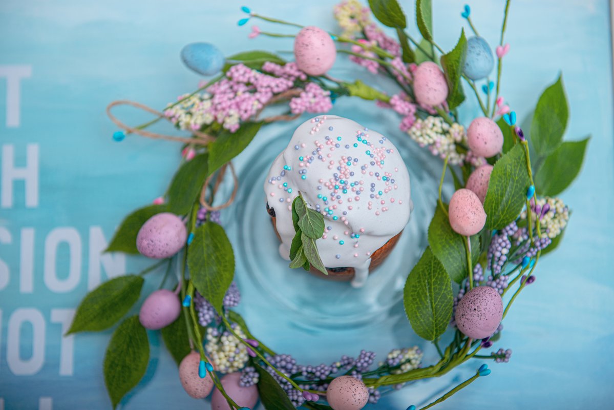 Easter cake in the center of a wreath of spring flowers example image 1