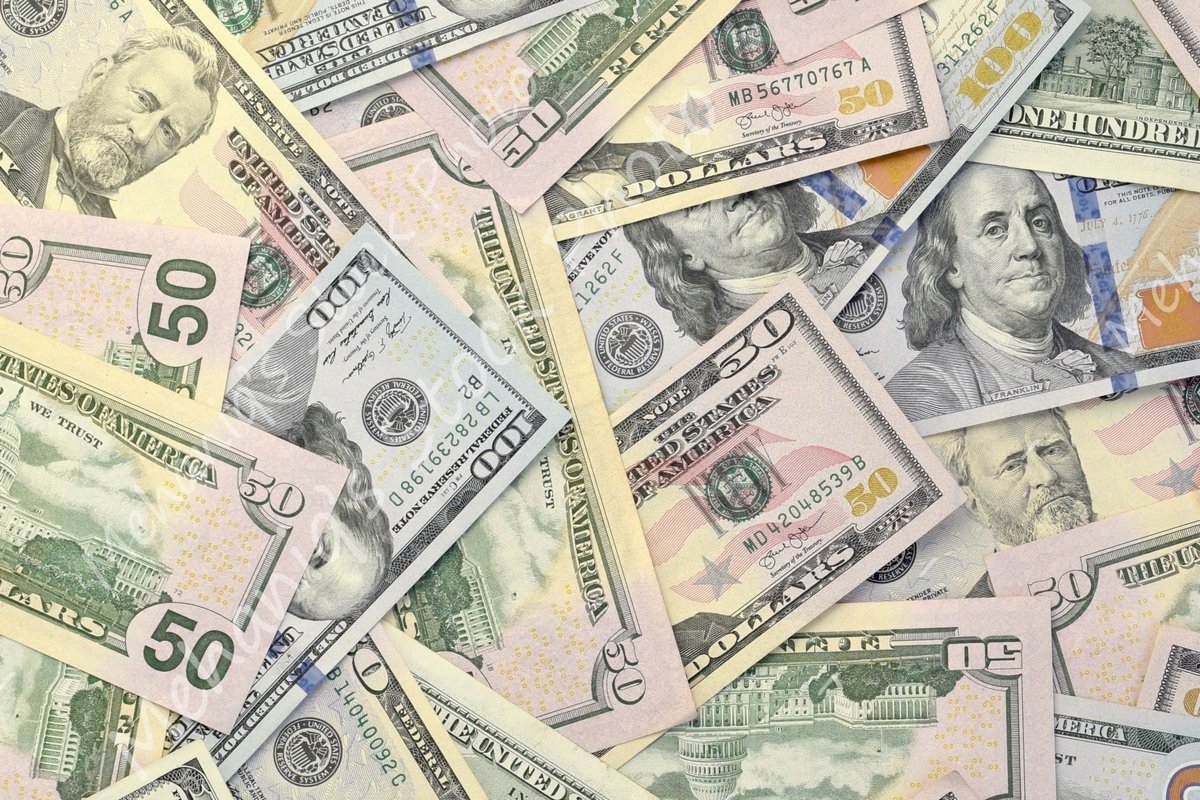 Many american dollar bills close up example image 1