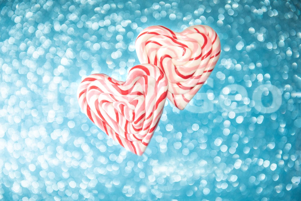 White and red candy in the shape of two hearts example image 1