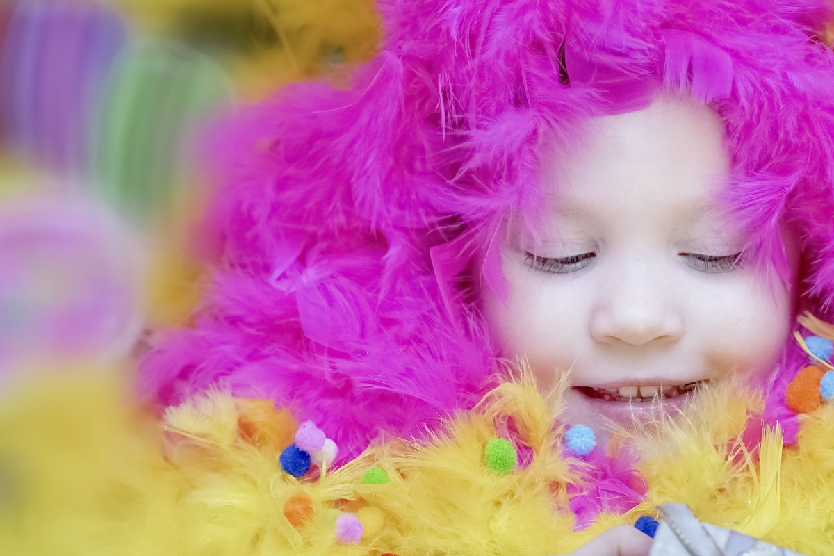 Emotional girl lies in a blurred festive setting. Birthday example image 1