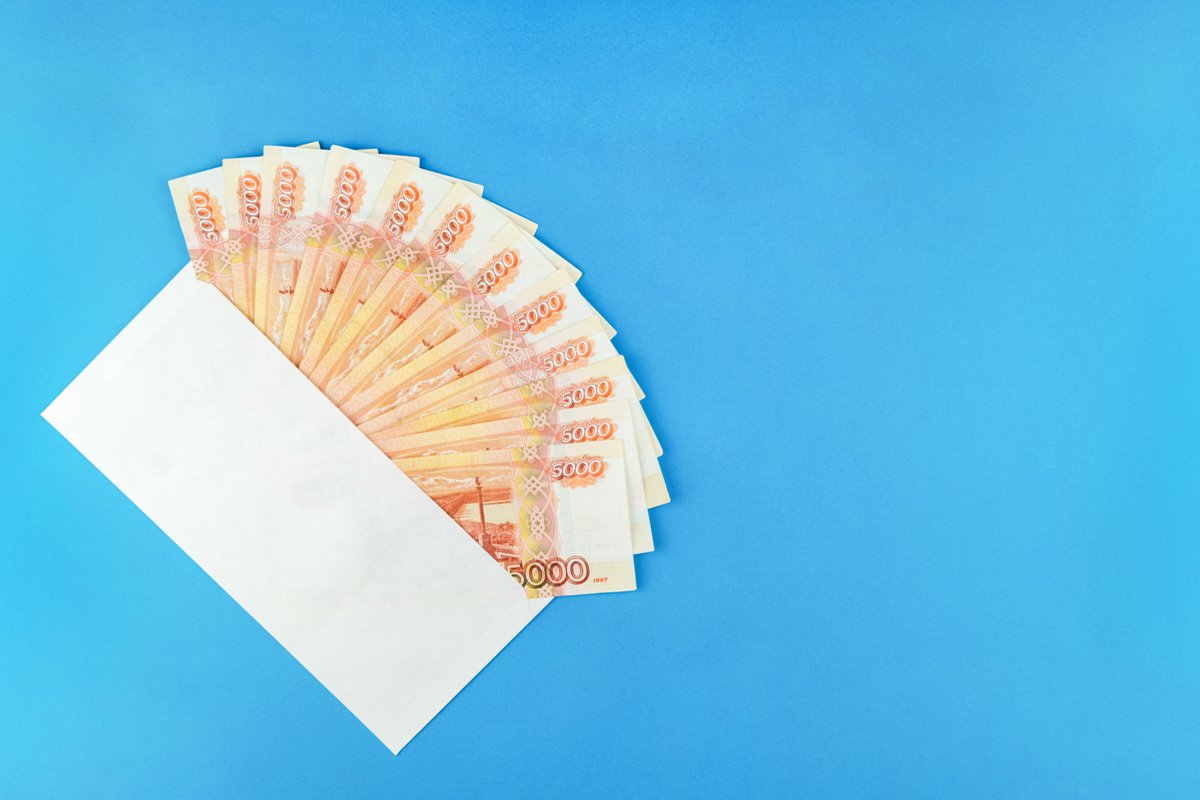 envelope with Russian currency on a blue background example image 1