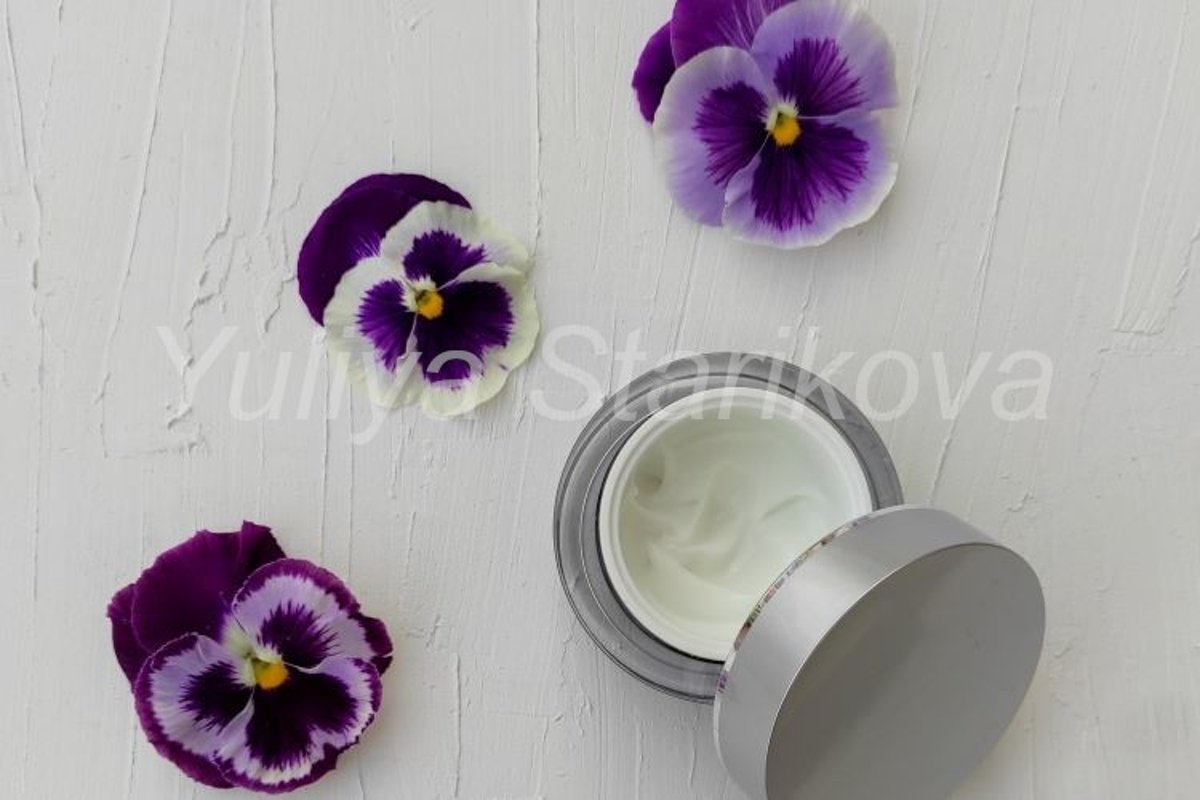 Jar of beauty cream with pansies flower. Skin care cosmetic. example image 1