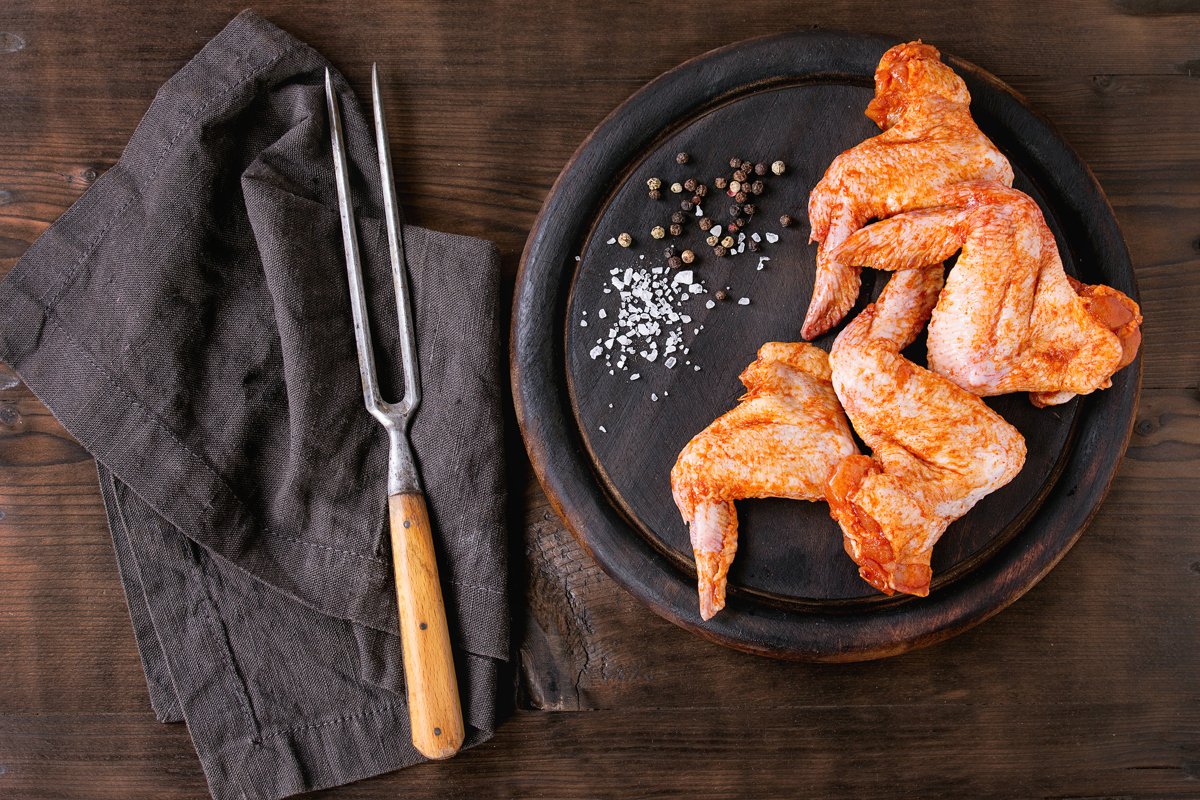 Raw Marinated chicken for BBQ example image 1