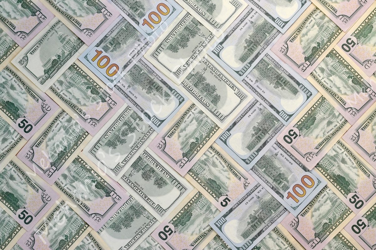 Many american dollar bills close up example image 1