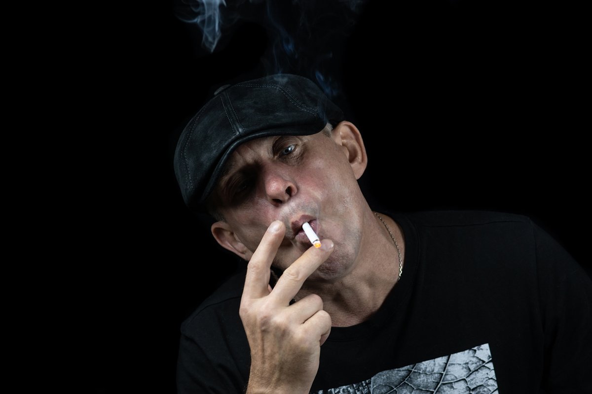 A man with a cigarette example image 1