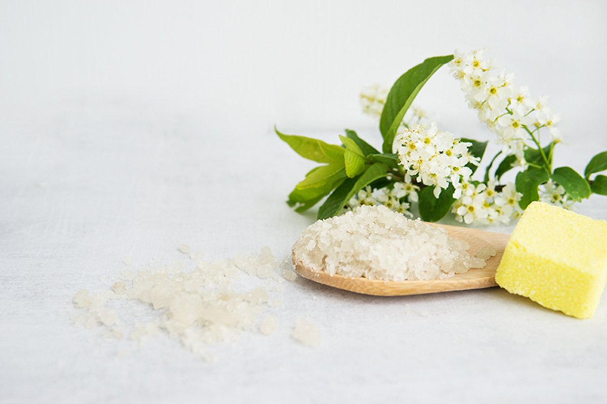 Spa-sea salt in a wooden spoon and shells example image 1