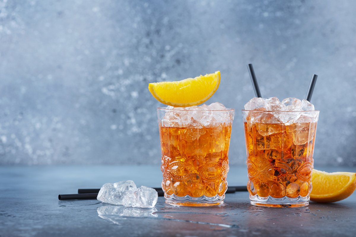 Two glasses of a traitional Italian cocktail aperrol spritz example image 1