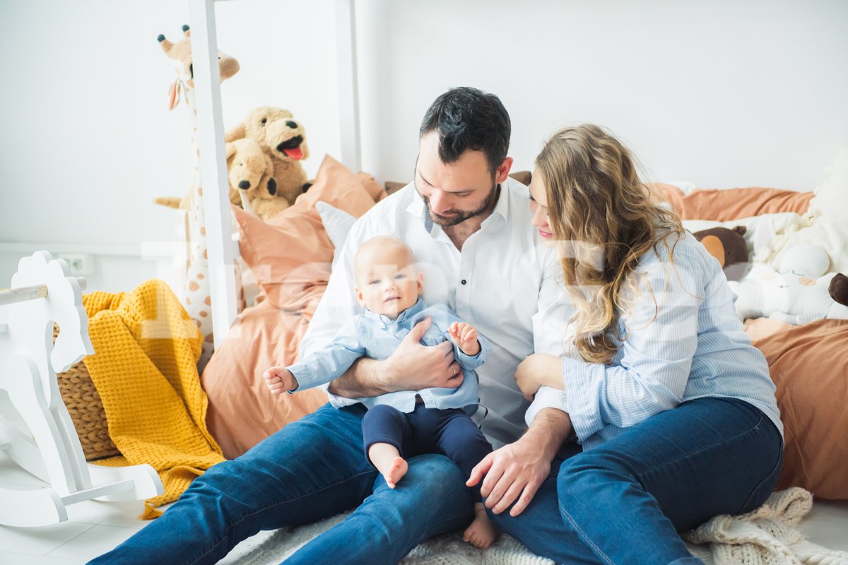 Happy family mother, father, child baby son at home example image 1