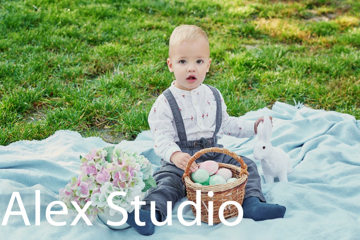 Easter baby boy with bunny and eggs example image 1