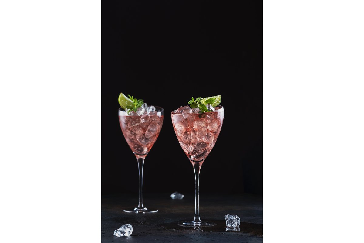 Summer cocktail with rose wine, lime, mint and ice example image 1