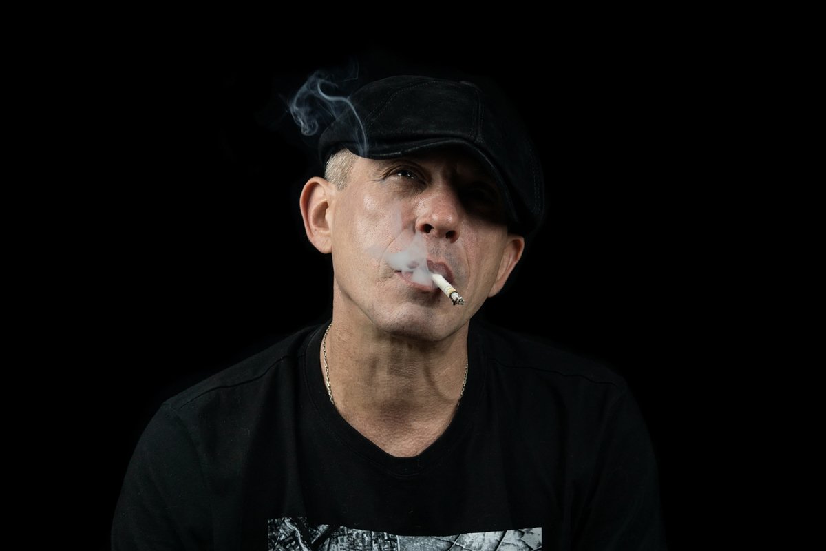 A man with a cigarette example image 1