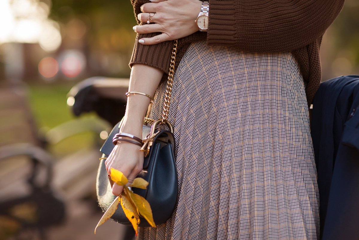 Autumn, details of clothes, a girl in an autumn image example image 1