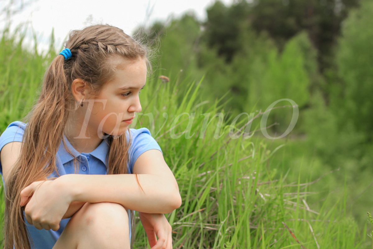 A young beautiful girl, a teenager walking in the Park example image 1