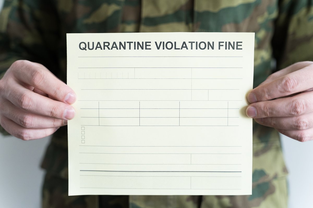 Police officer with self-isolation violation fine. Receipt example image 1
