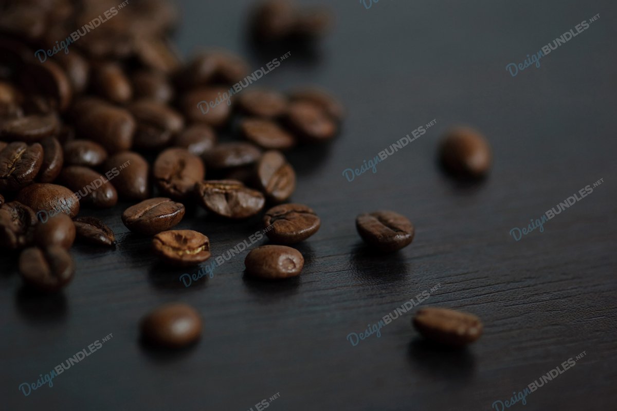 Stock Photo - Roasted coffee beans on a slate plate example image 1