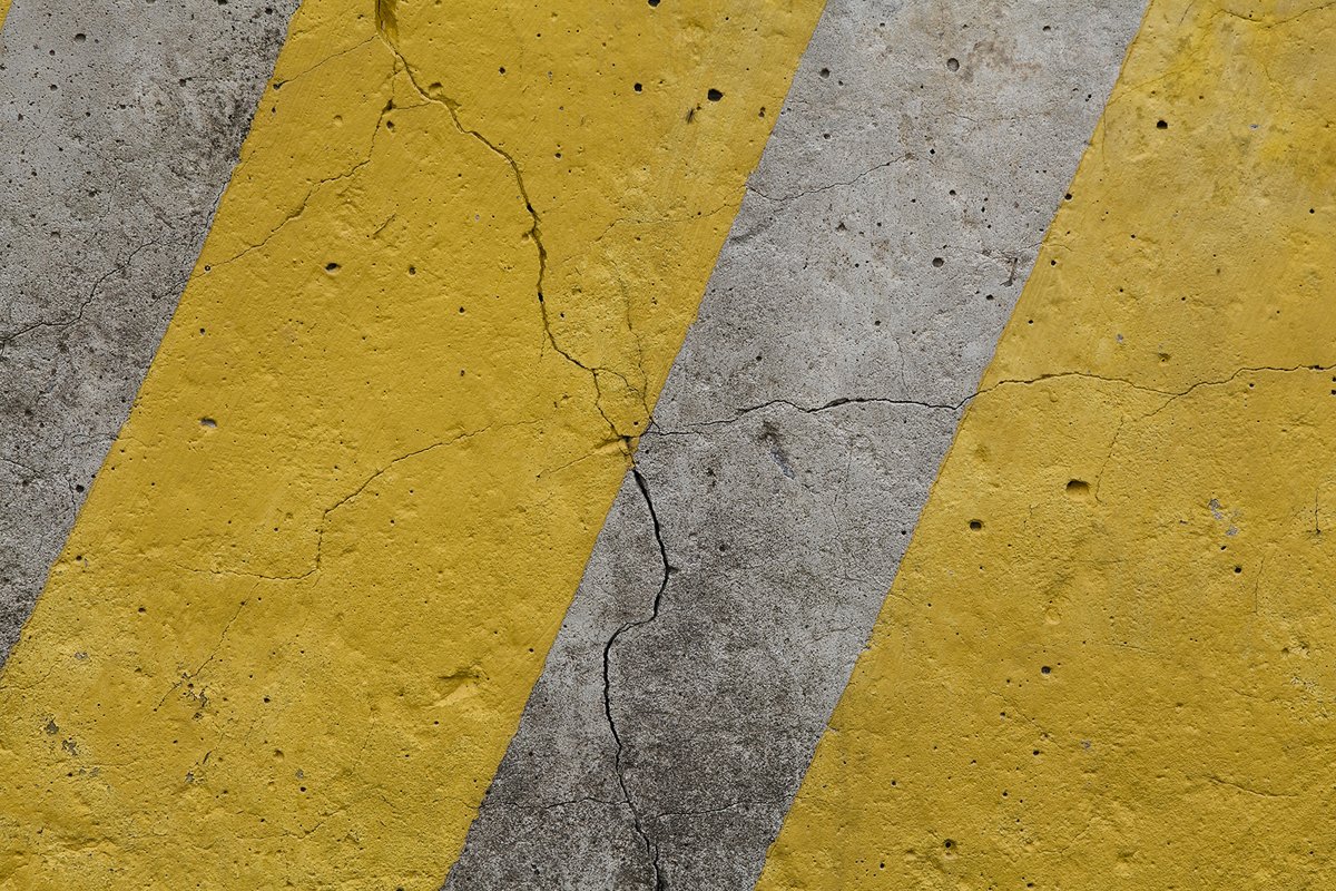 Grunge grey wall with yellow stripes. example image 1