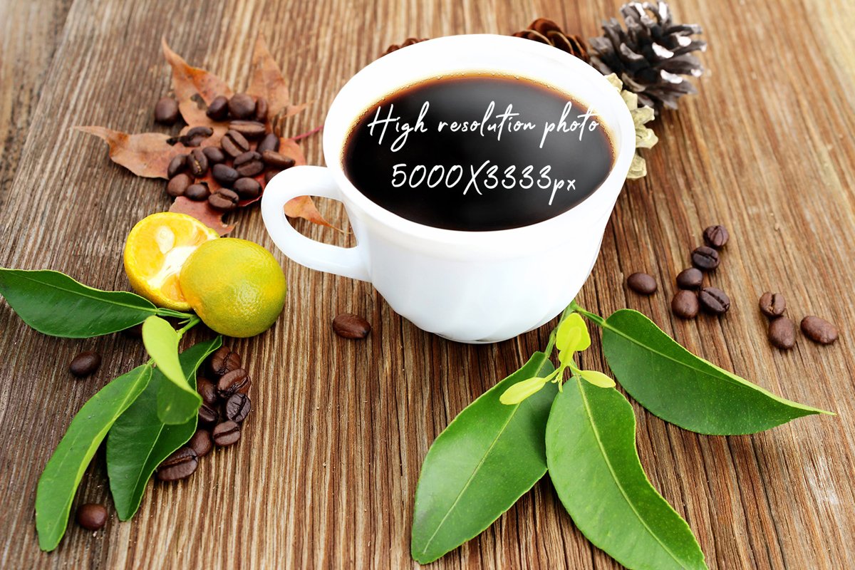 Cup of coffee with coffee grains on old wooden background example image 1