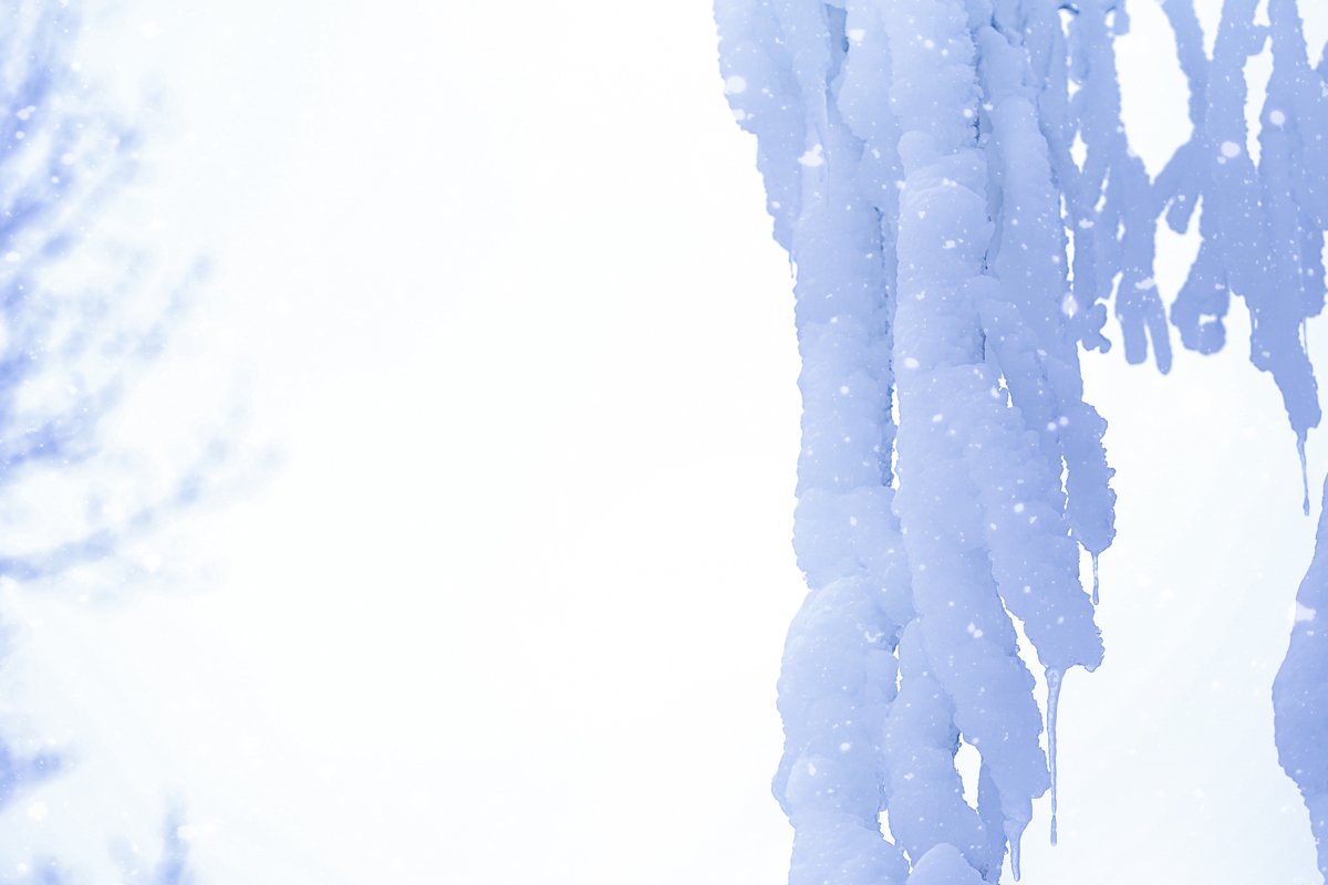 Huge icicles on trees in winter example image 1
