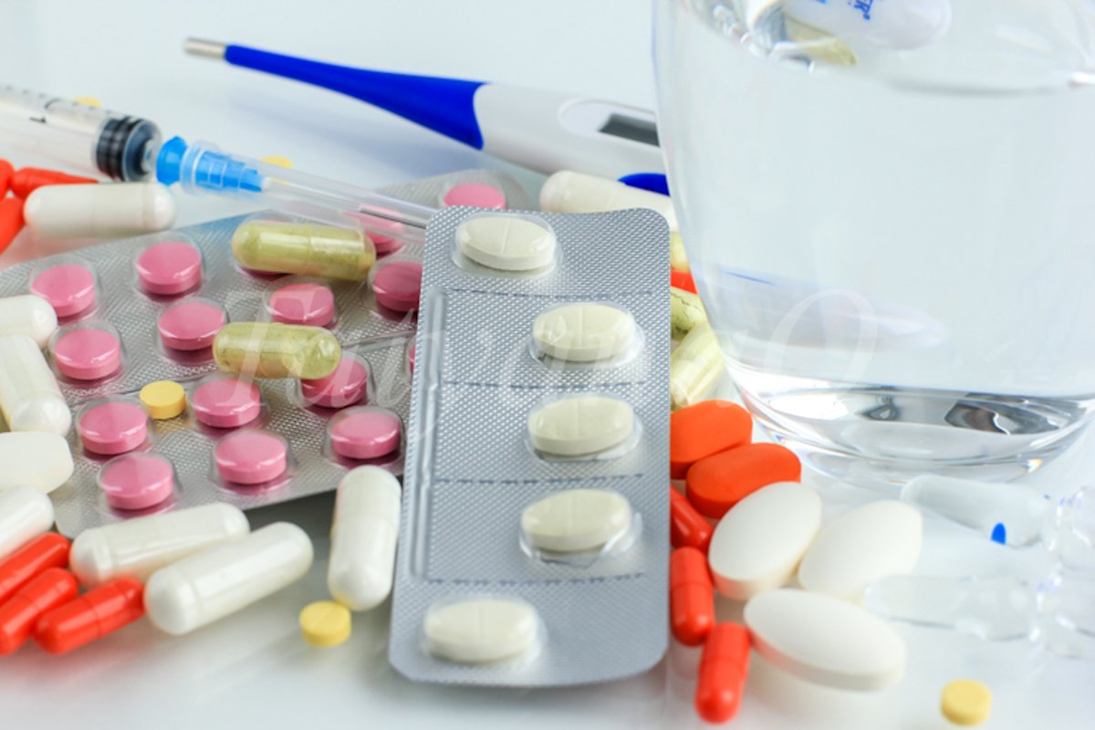 Multicolored pills, tablets against the virus, flu, disease example image 1
