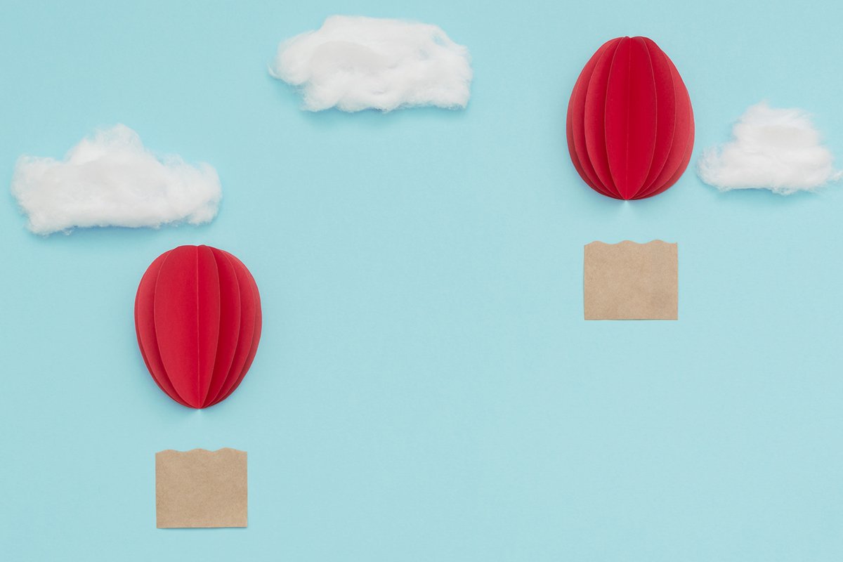 Easter egg hot air balloons made of paper on blue sky example image 1