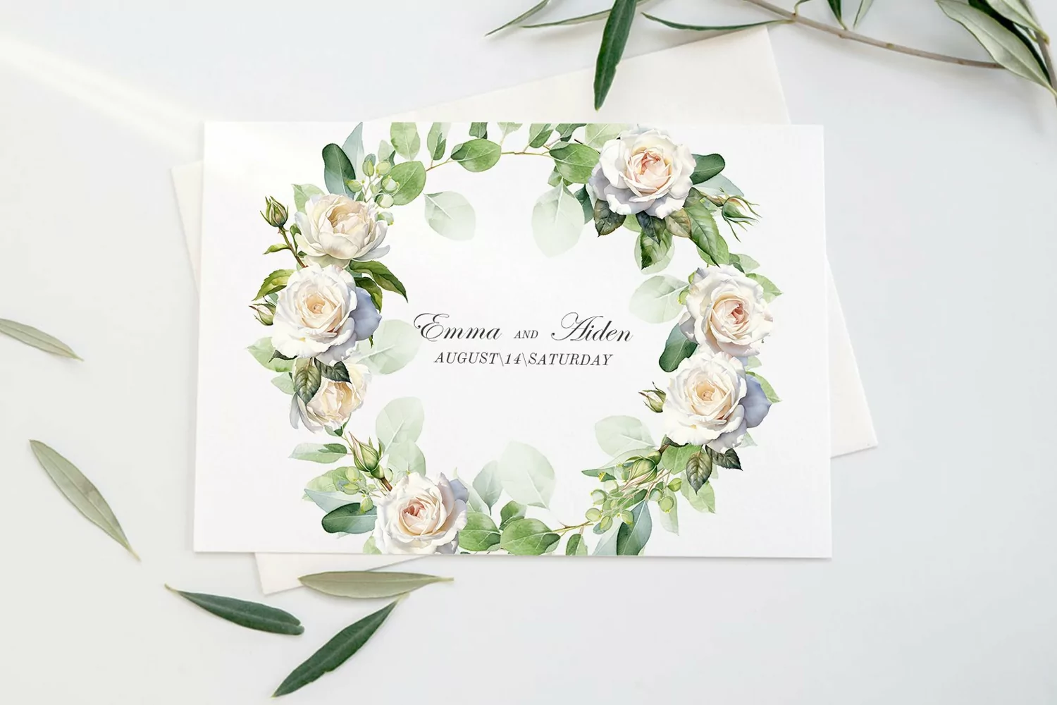 Watercolor rose and eucalyptus wreath
