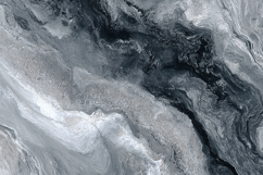 A marble surface with swirling black and white patterns Product Image 1