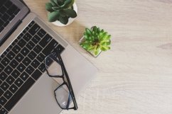 Stylish workspace on a wooden office desk, business concept Product Image 1