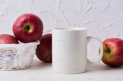 White coffee mug mockup with red apples in wicker basket Product Image 5