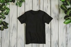 Black T-shirt Mockup on wooden background Product Image 1