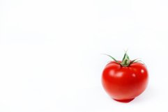 Red tomato on a white background Product Image 1