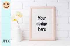 Wooden frame mockup with soft yellow orchid in vase Product Image 1