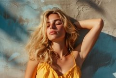 Serene beauty enjoying sunlight against textured wall Product Image 1