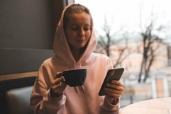 Smiling girl working in cafe Product Image 1