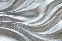 A shiny silver fabric with wavy folds Product Image 1