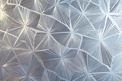A metallic surface with a geometric patterns Product Image 1