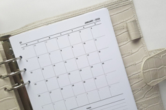 2026 dated monthly planner in A5 size featuring elegant typography, numbered dates January through December, and professional layout ready for home printing on standard paper.