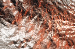 A shiny, metallic fabric with a textured, reflective surface Product Image 1