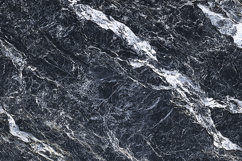 A dark marble surface with white veins Product Image 1