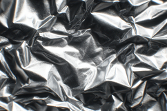 Crumpled silver foil with a shiny reflective surface Product Image 1
