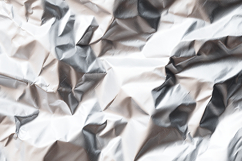 Crumpled silver foil with textured wrinkled surface Product Image 1