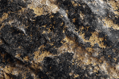 A textured rock surface with black, gold,and gray colors Product Image 1