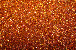 Sparkling orange glitter texture with bright shiny particles Product Image 1