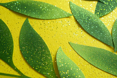 Green glitter leaves on a bright yellow background Product Image 1