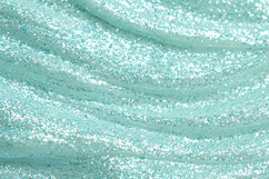 Sparkly, glittery, turquoise surface with wavy lines Product Image 1